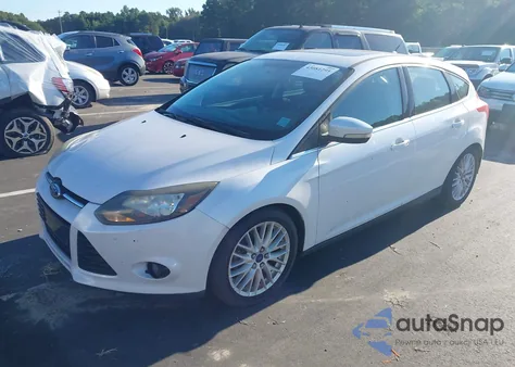 2014 Ford Focus Titanium from USA, damaged, VIN 1FADP3N2XEL190586